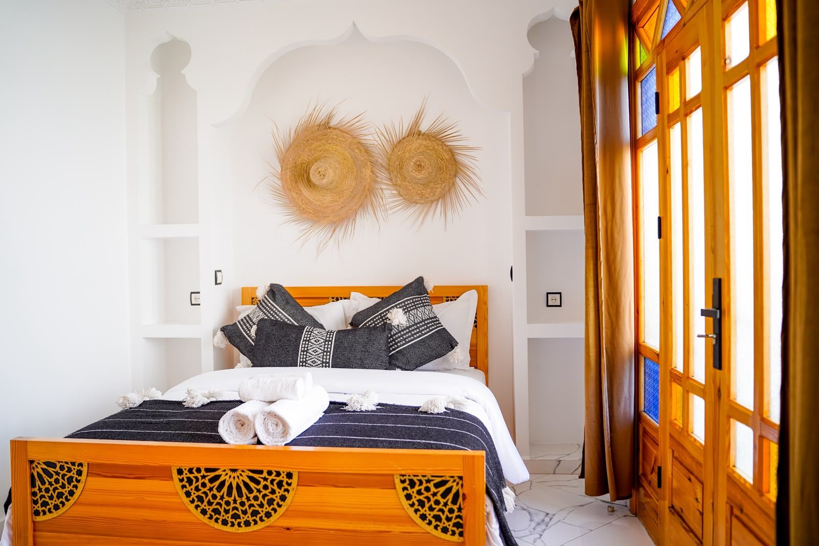 Double bed under woven straw hats