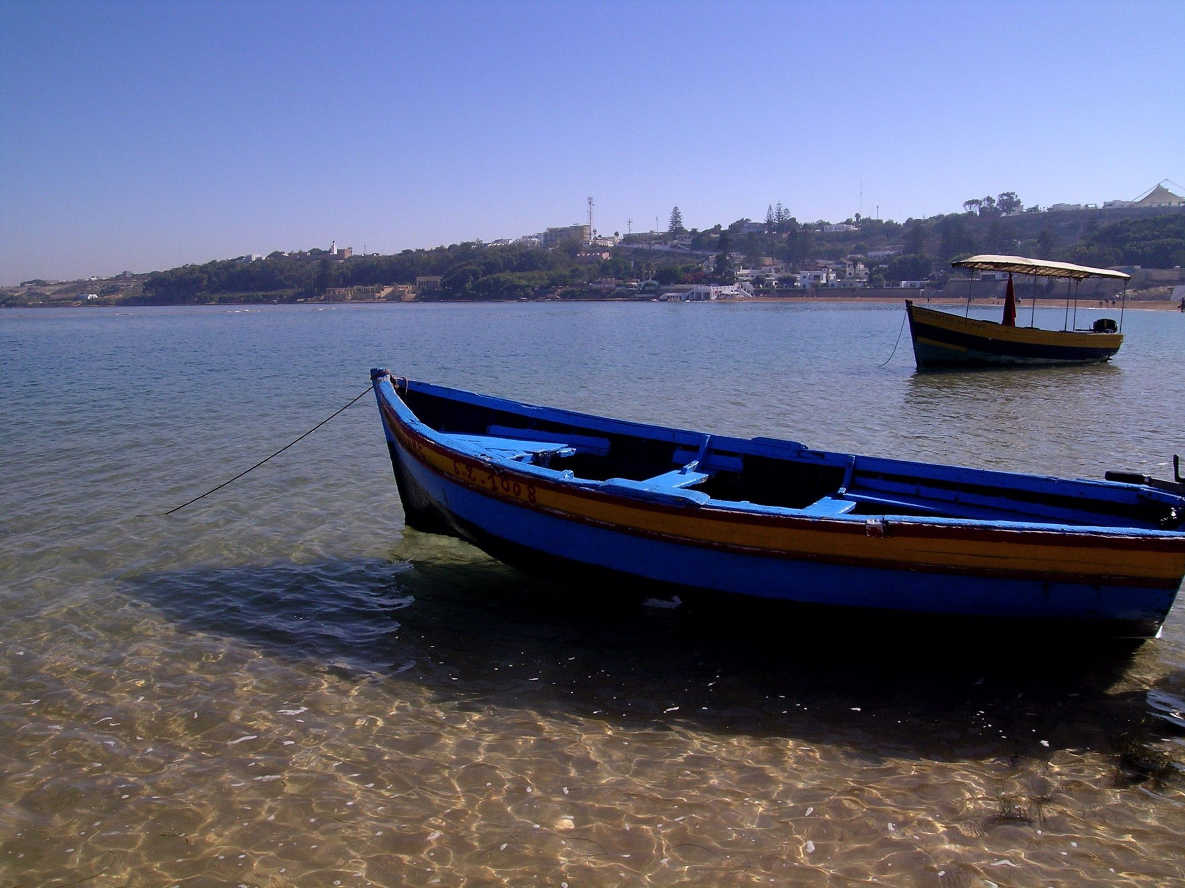 A blue boat on the Oualidia lagoon
